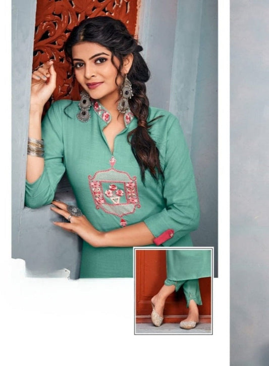 Elegance Redefined: Heavy 14 Kg Riyon Kurti and Pant Ensemble with Embroidery